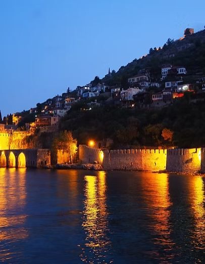 Cat Scratch Treatment in Konakli | Online Prescription | Alanya castle walls lit at night above the sea | E-rx.online
