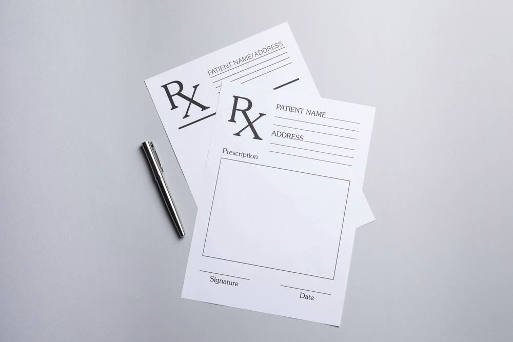 Blank prescription forms and a pen | Refill Your Prescription Online if You Have Lost or Run Out | Online Doctor | E-rx.online
