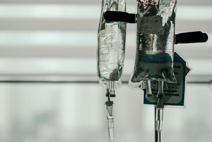 Two IV bags of saline hanging for infusion therapy | Get an IV Drip from a Doctor in Turkey | Online Doctor | E-rx.online