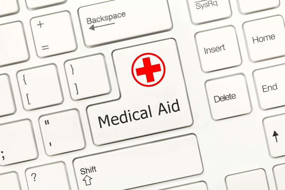 Keyboard key labelled Medical Aid with a red cross for urgent online care | Urgent Care in Beldibi | Online Doctor | E-rx.online