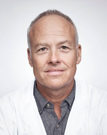 Male doctor in a white coat | Need a Doctor in Antalya? Video Consultation and | Online Doctor & Online Prescription | E-rx.online
