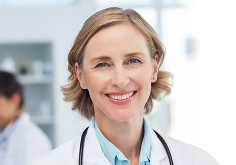 Smiling female doctor with a stethoscope | Mugla Traveller Health Guide | Online Doctor & Online Prescription | E-rx.online